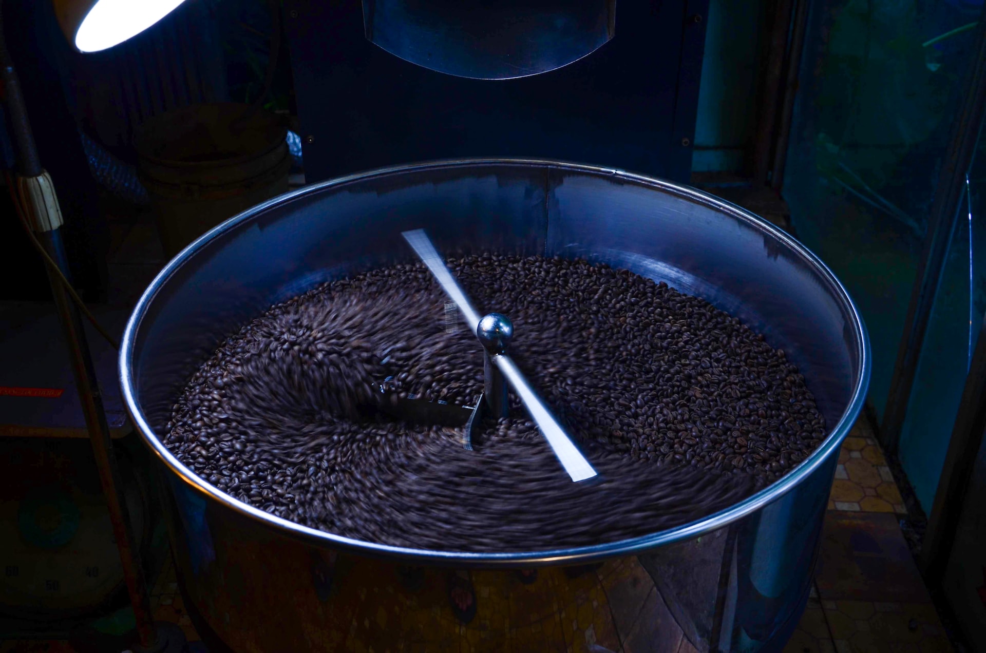 a large metal bucket filled with lots of chocolate